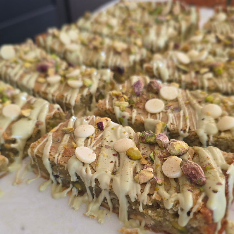 Pistachio and white chocolate blondie slice